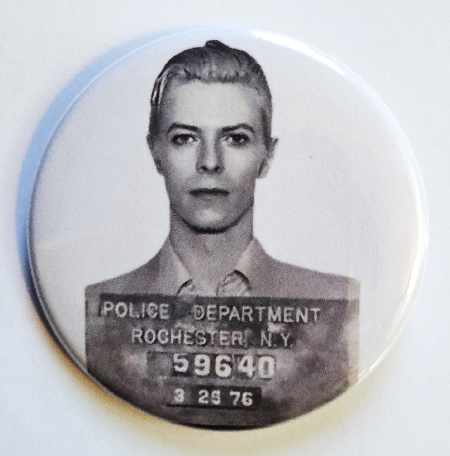 Celebrity Mugshot Buttons Magnets & Bottle Openers.