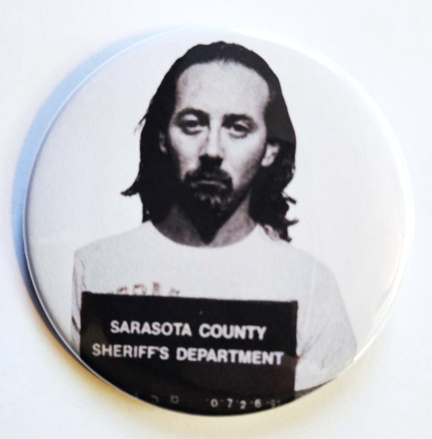 Celebrity Mugshot Buttons Magnets & Bottle Openers.