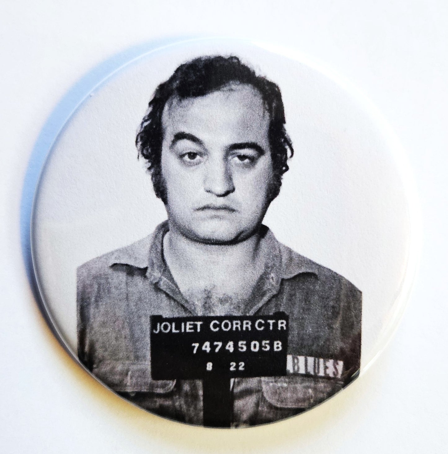 Celebrity Mugshot Buttons Magnets & Bottle Openers.