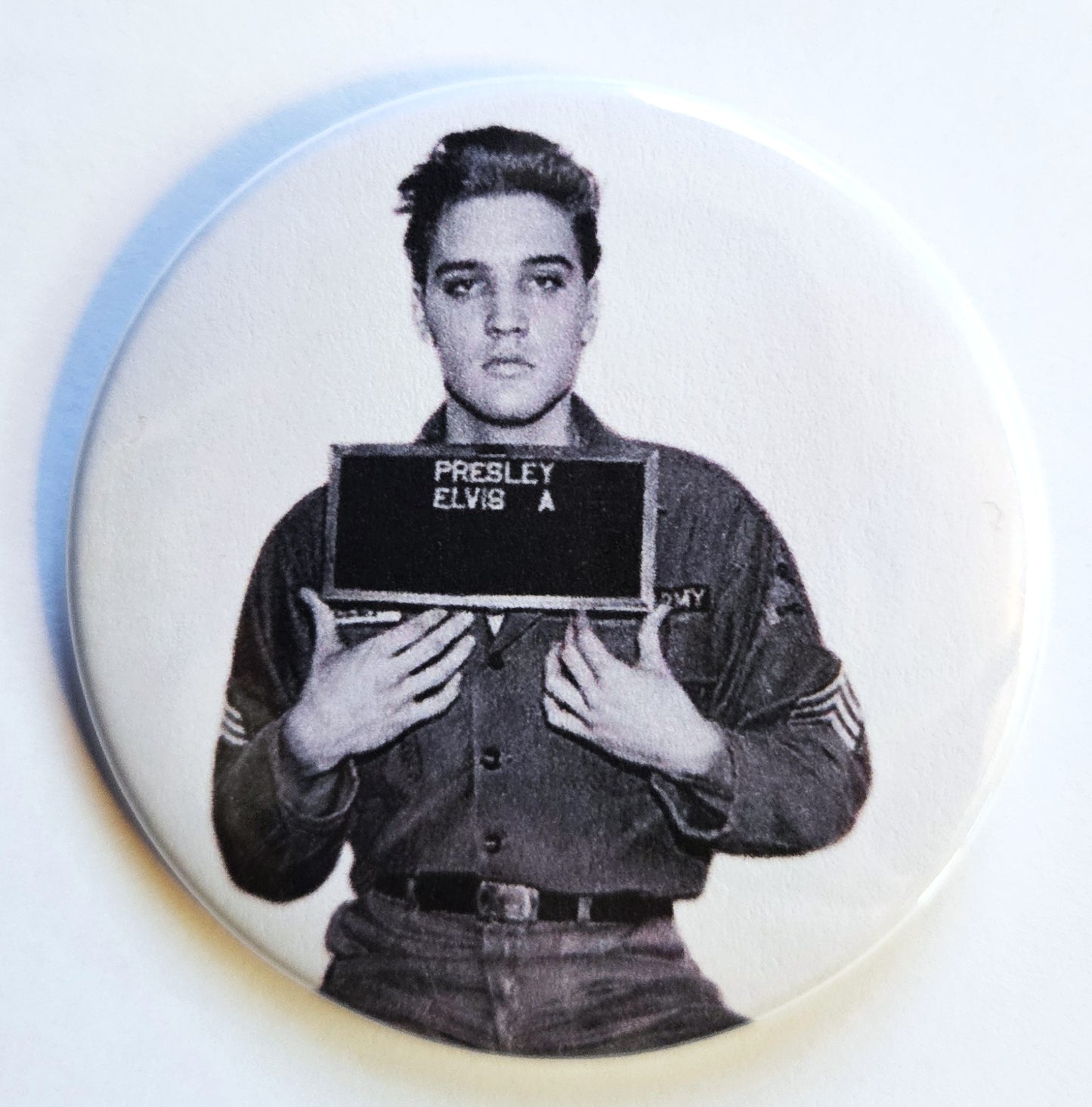 Celebrity Mugshot Buttons Magnets & Bottle Openers.