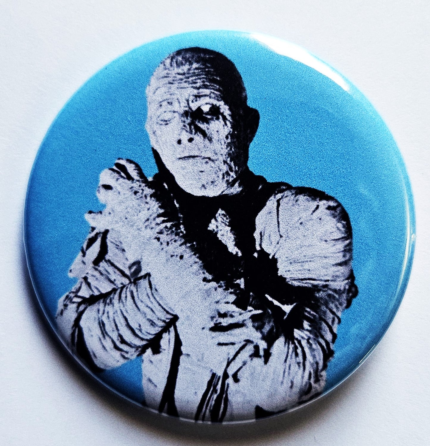 Horror Movie Monsters pinback Buttons & Bottle Openers.