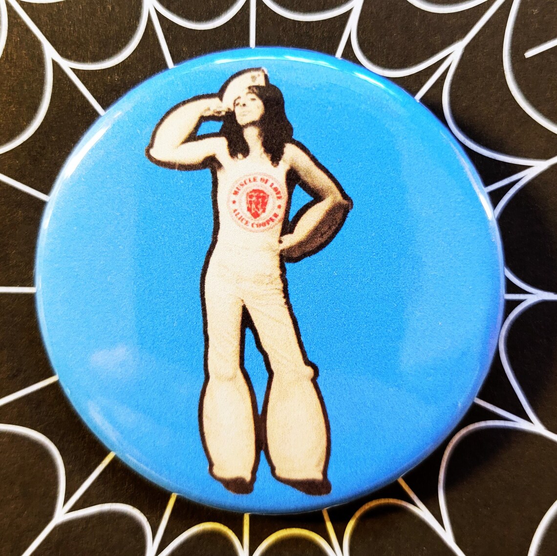 Alice Cooper pinback Buttons and Bottle Openers.